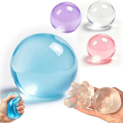 Translucent squishy stress balls being squeezed by hand